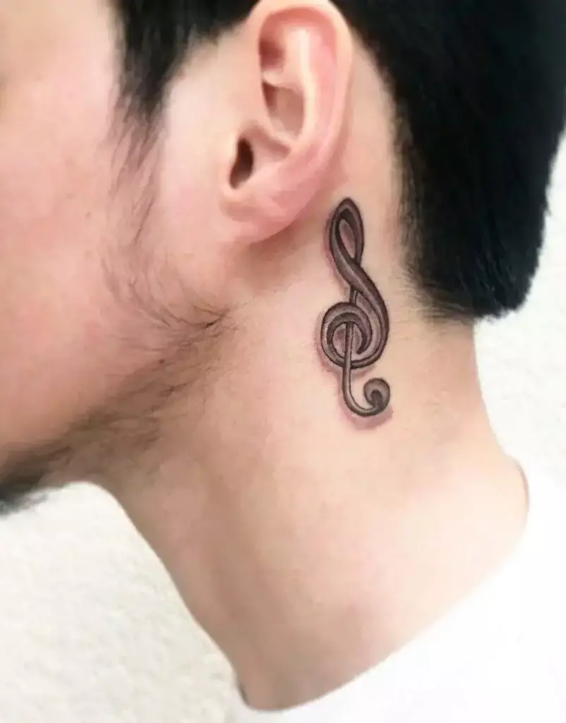 music note tattoo behind ear 21