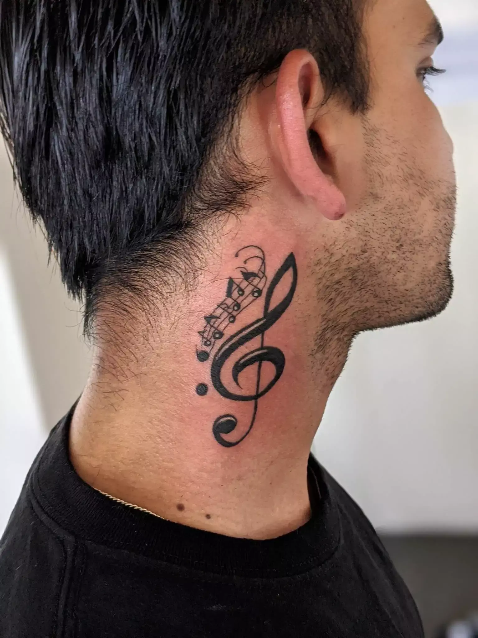 music note tattoo behind ear 44