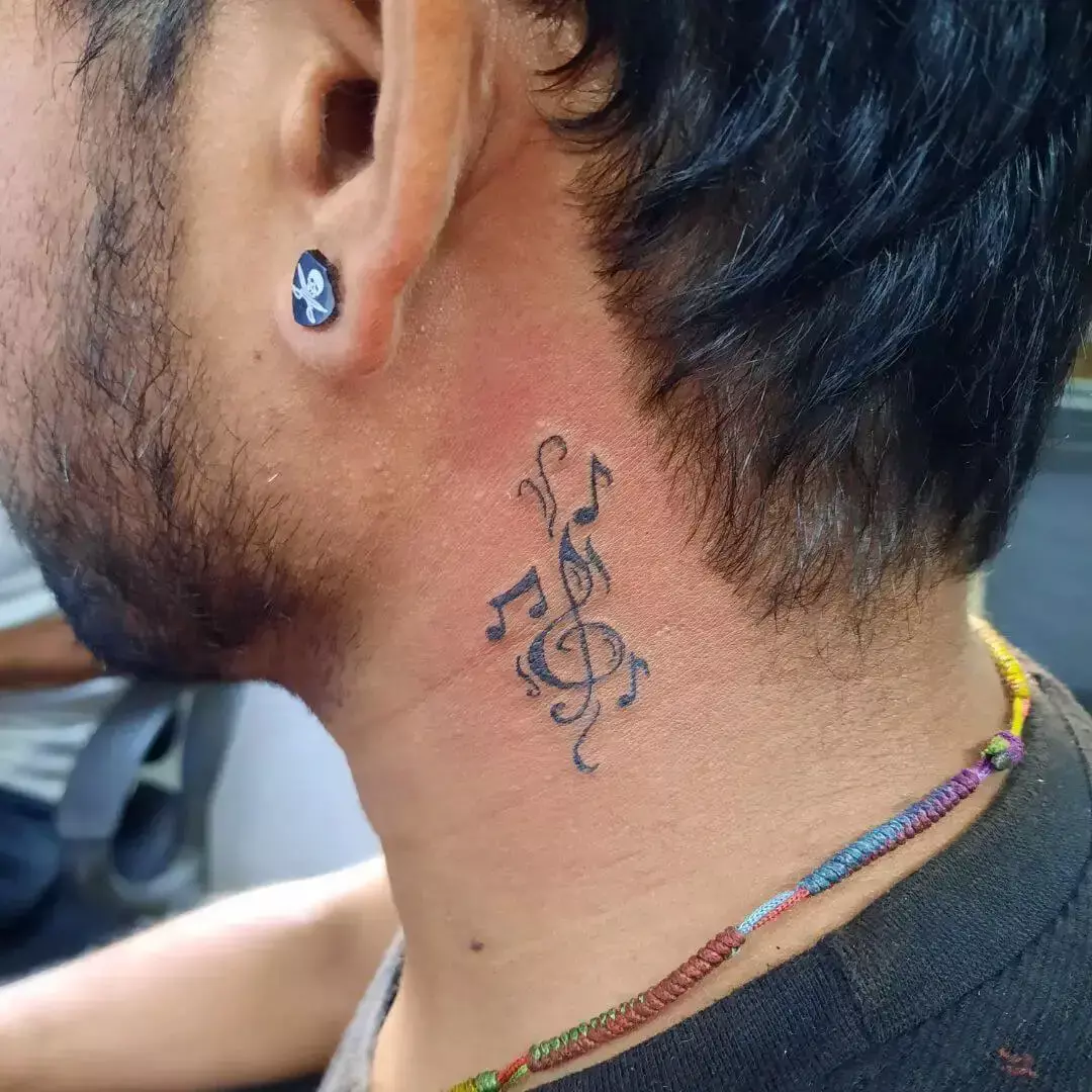music note tattoo behind ear 46