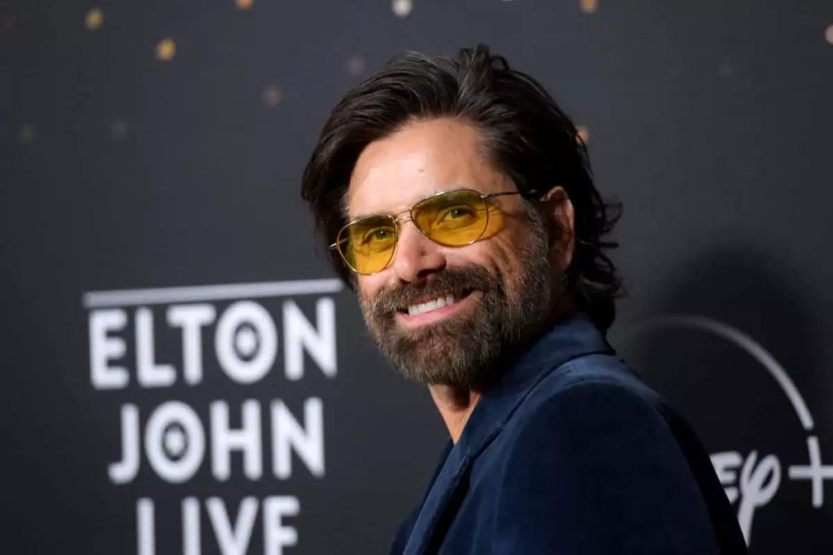 John Stamos attends the Disney+ "Elton John Live: Farewell From Dodger Stadium" | Getty Images | Photo by Michael Tullberg