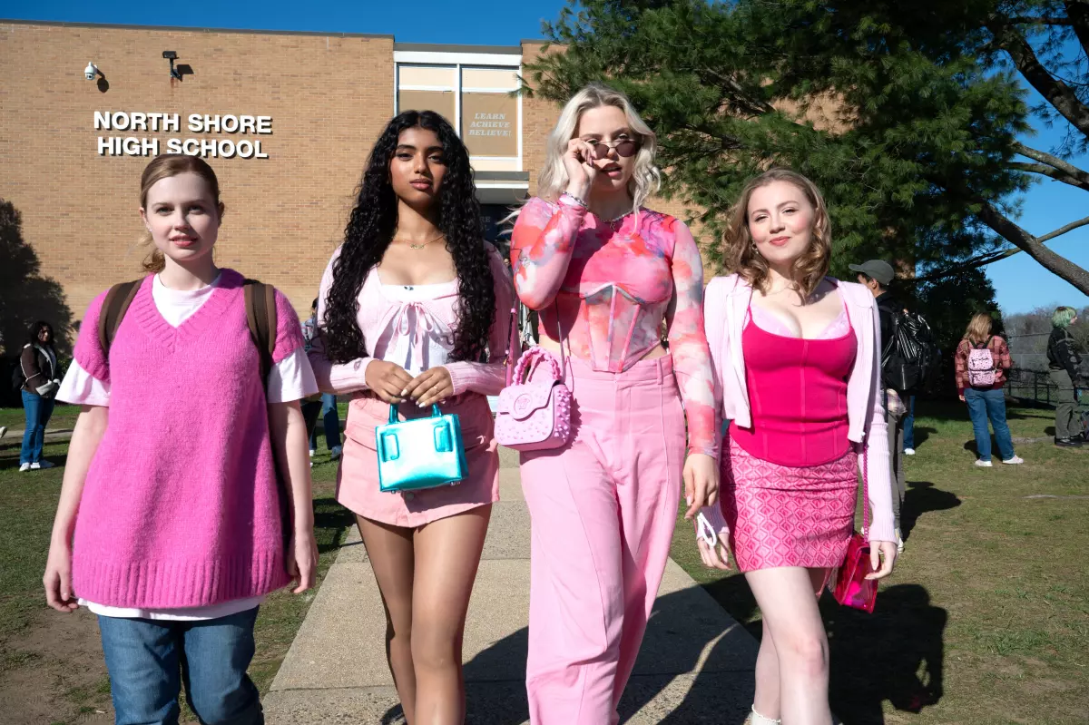 Cady (Angourie Rice, far left) falls in with the clique-y Plastics - Karen (Avantika), Regina (Renee Rapp) and Gretchen (Bebe Wood) - in the musical "Mean Girls."