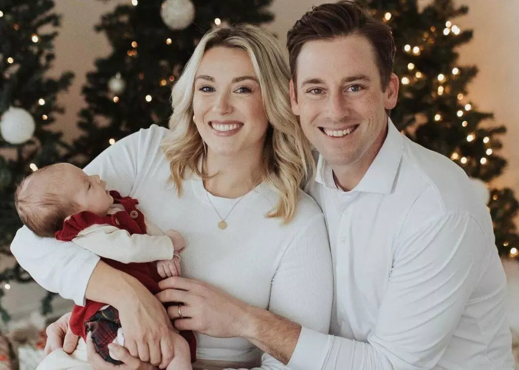 Hannah Flood with her husband and their daughter