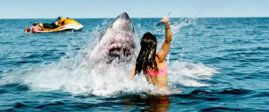 Woman about to get eaten by a shark in Shark Bait