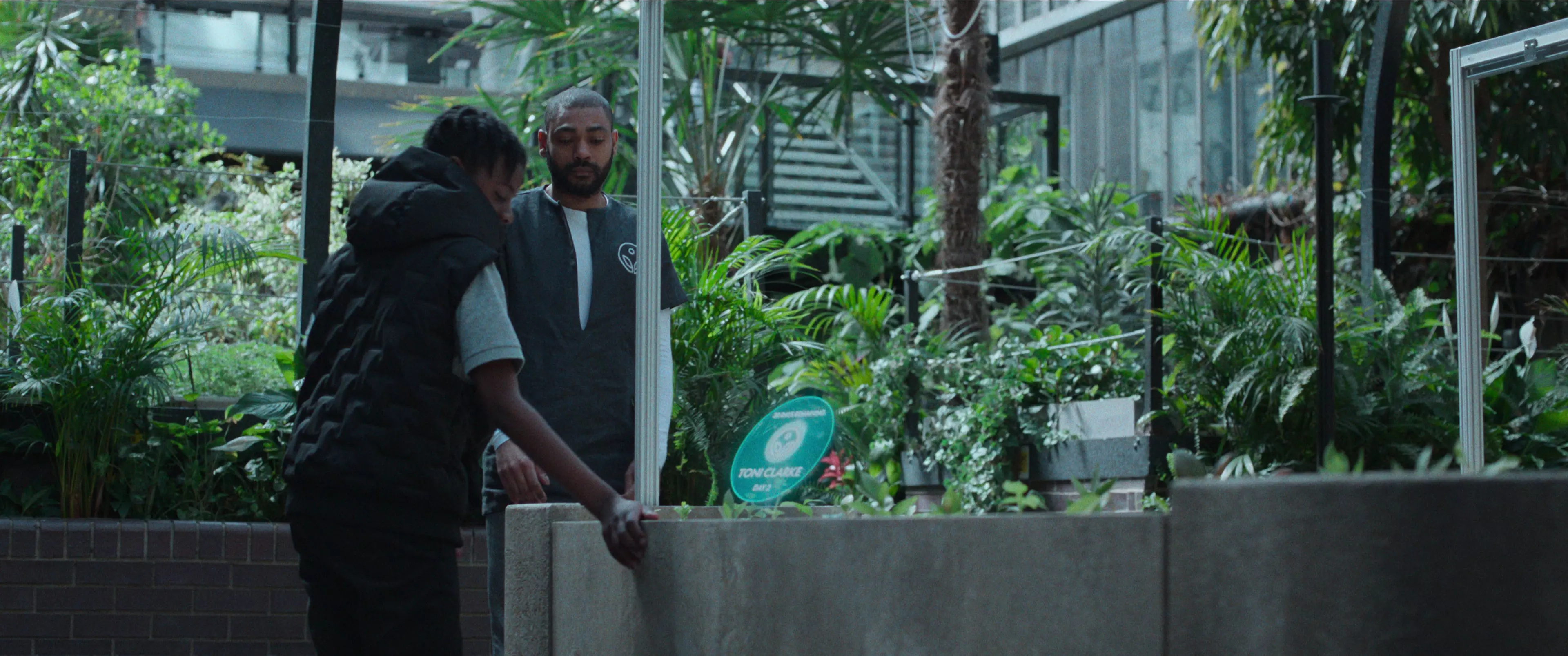 Izi (Kane Robinson, right) takes Benji (Jedaiah Bannerman) under his wing in the dystopian sci-fi drama "The Kitchen."