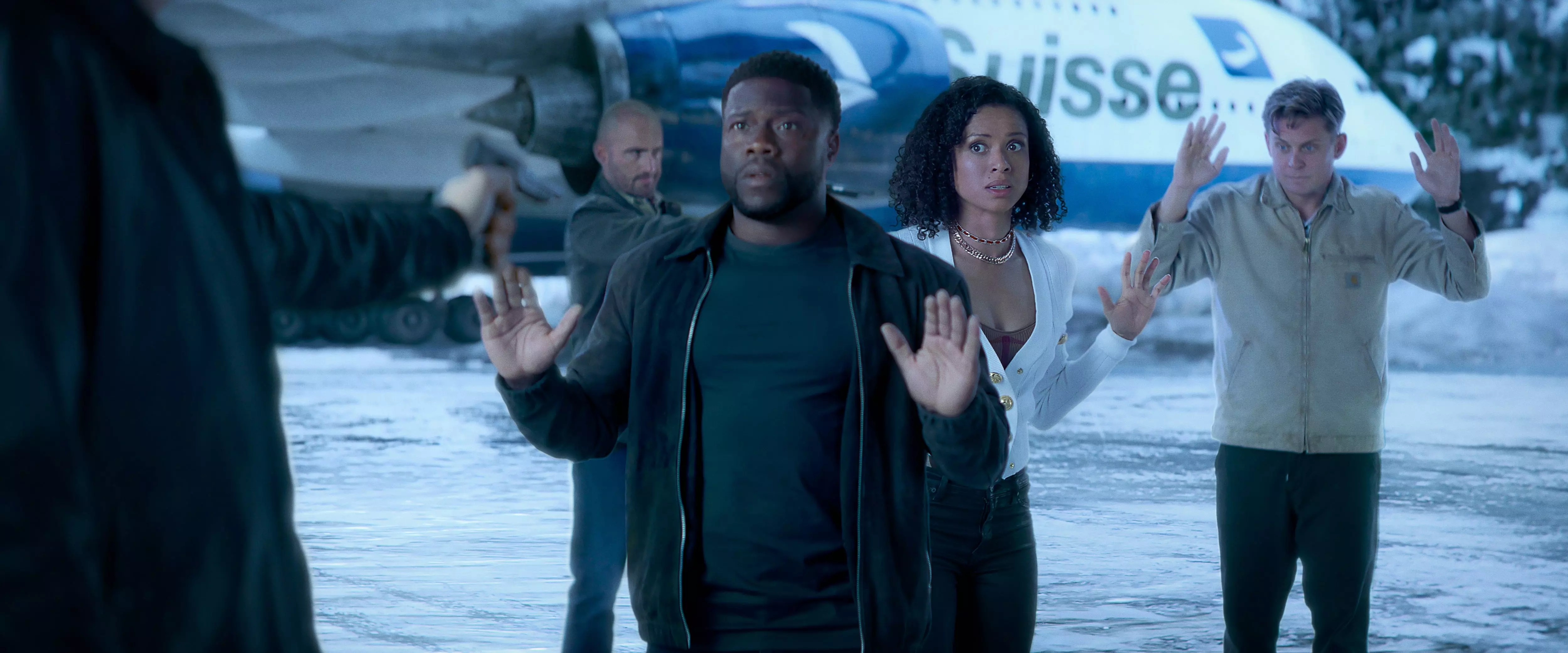 Cyrus (Kevin Hart, center) and his ex Abby (Gugu Mbatha-Raw) are in a spot of trouble in the action-packed heist film "Lift."