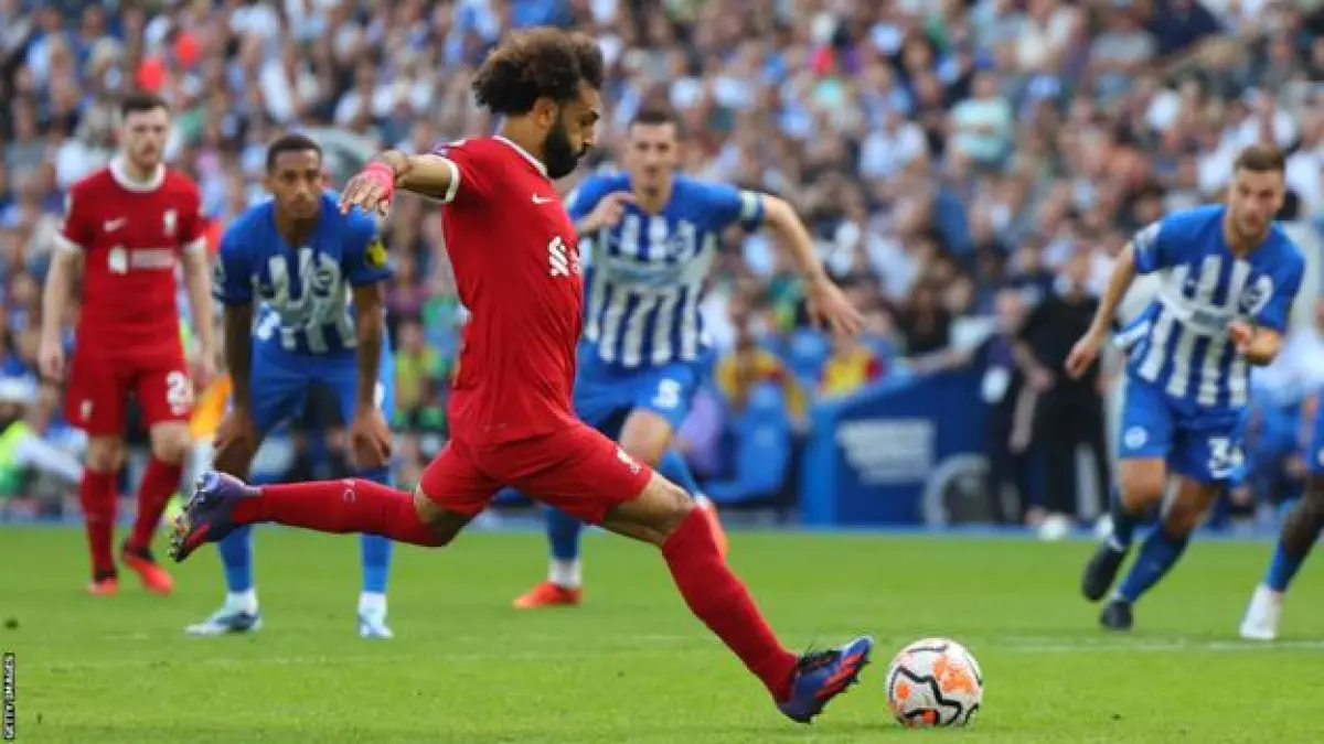 Mohamed Salah scores a penalty for Liverpool against Brighton in the Premier League