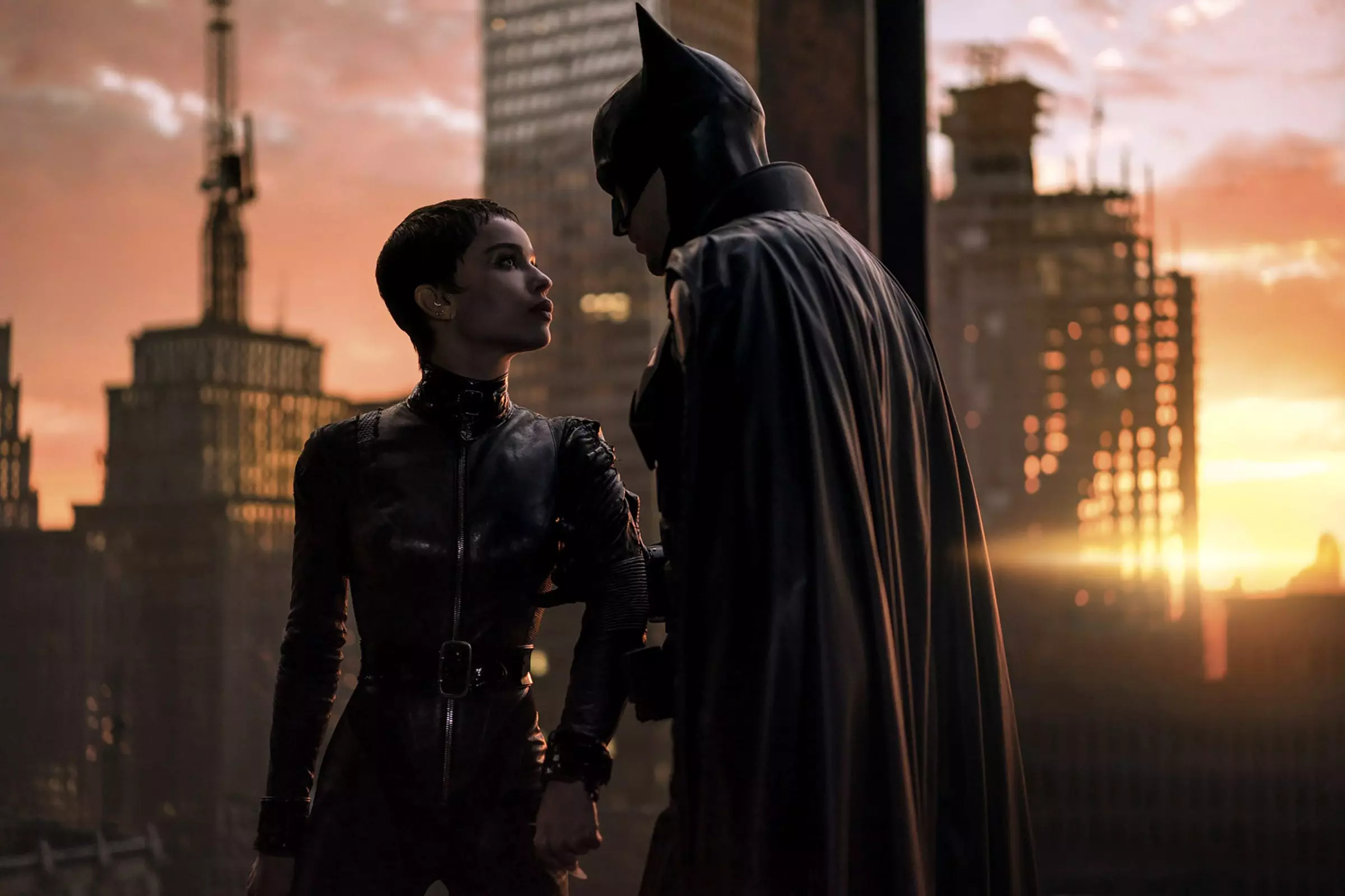 Catwoman (Zoë Kravitz) and Batman (Robert Pattinson) partner up as allies (and love interests) when a serial killer is loose in Gotham City in director Matt Reeves