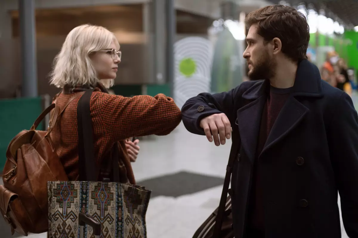 Paula (Lucy Boynton, left) and Michael (Kit Harington) are strangers who meet on a train at the start of the COVID-19 pandemic in Amazon anthology series "Modern Love."