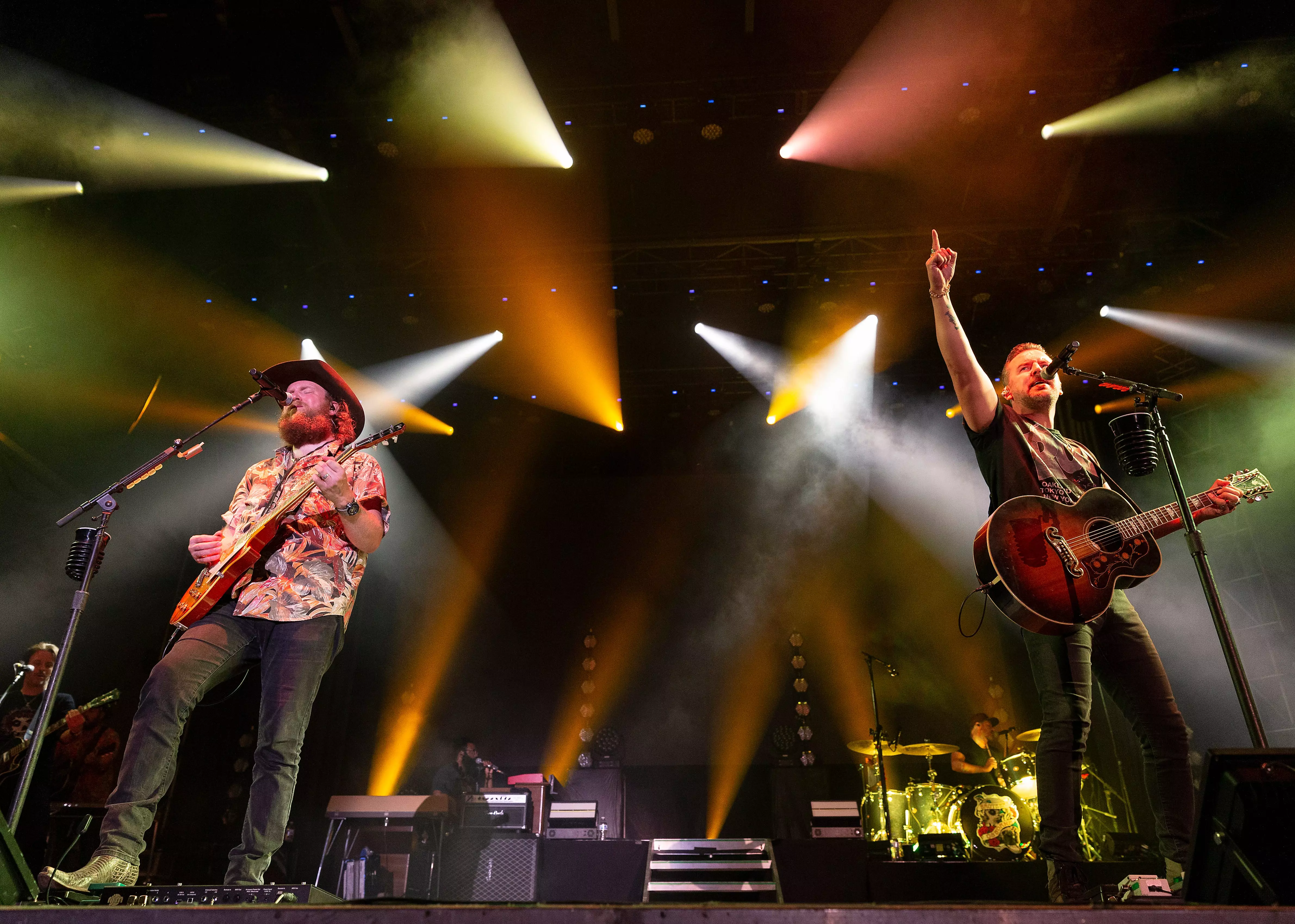 John Osborne and T.J. Osborne of Brothers Osborne perform on stage at PNE Amphitheatre on September 01, 2022, in Vancouver, British Columbia, Canada.