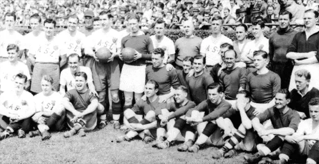 Liverpool players pose with an American All-Stars team (white) in 1946. Photo courtesy of Liverpool FC