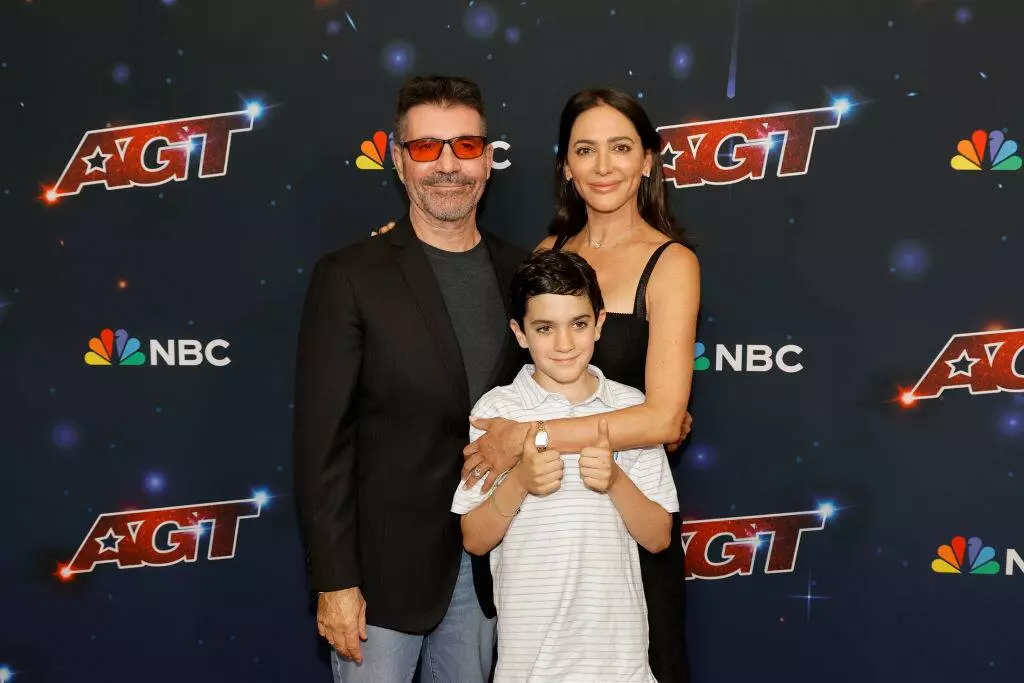 Simon Cowell and son Eric Cowell attend a ceremony honoring Simon Cowell