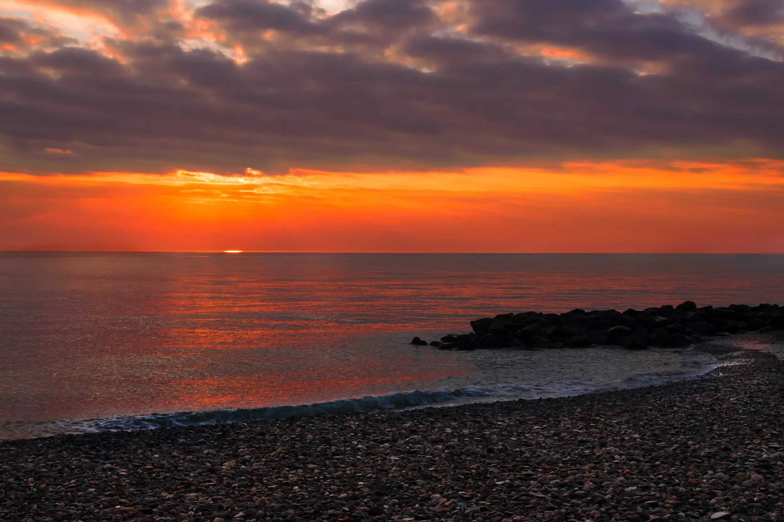 The sun rising over the Irish Sea at Bray